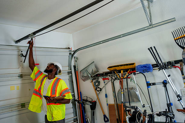 Professional Garage Door Panel Replacement technician working in Montgomery County County, IA